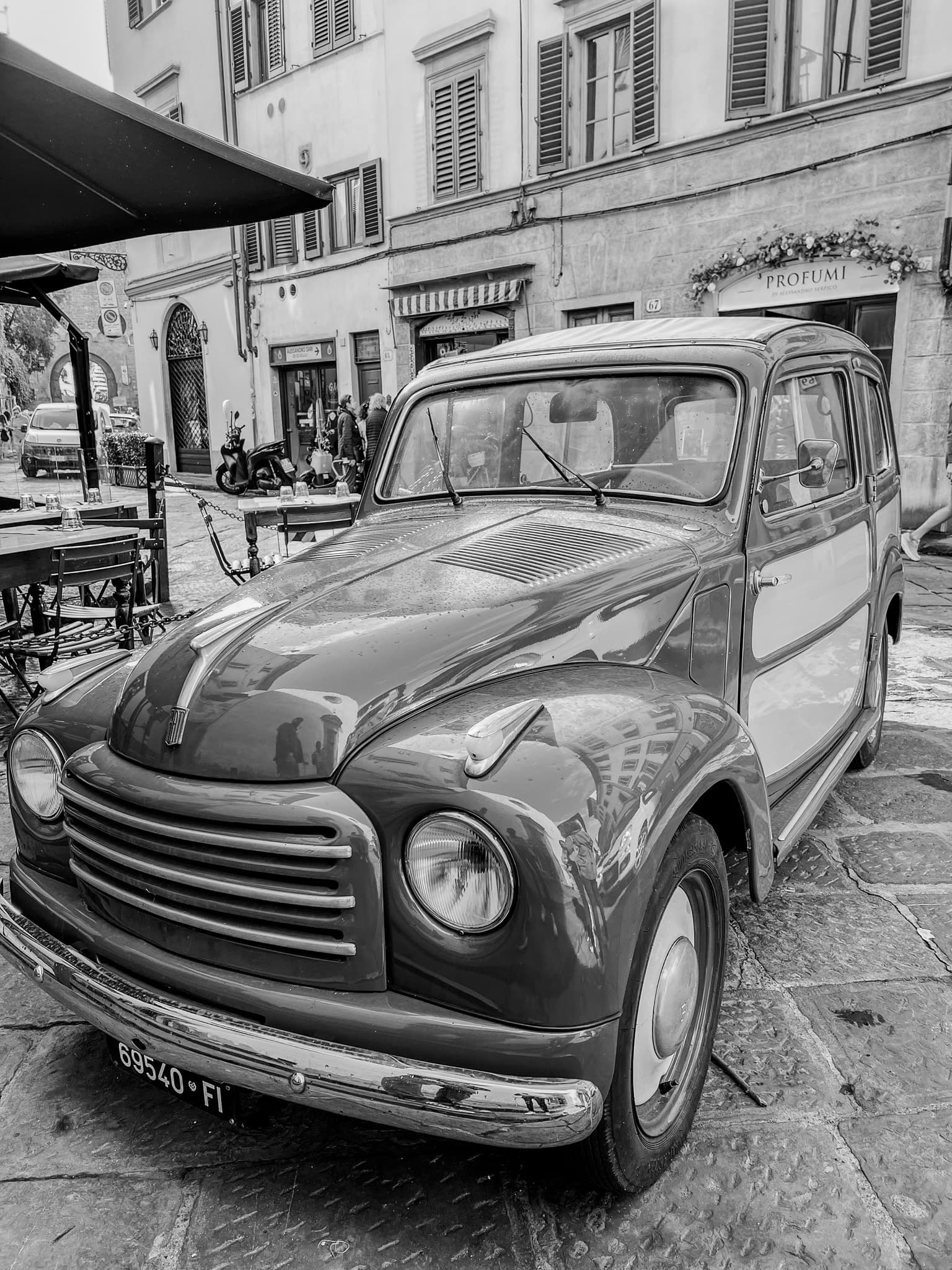 Vintage car on a cobbled street