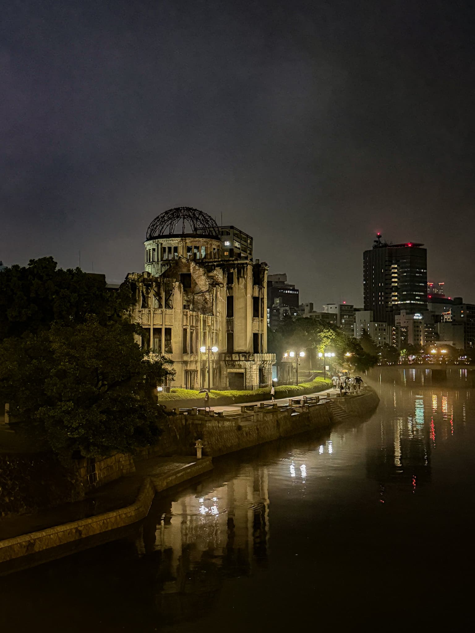 Atomic Bomb Dome reflected in the river at night