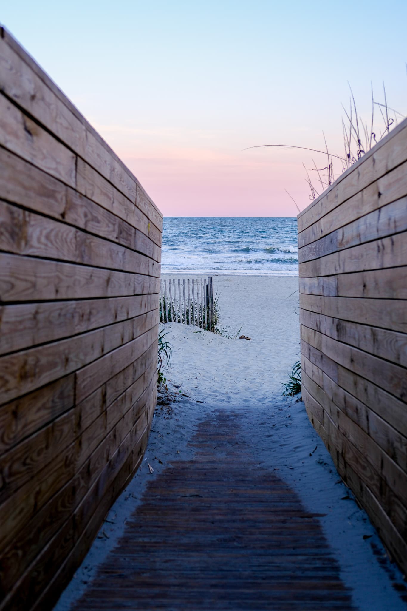 Wooden boardwalk leading to the beach